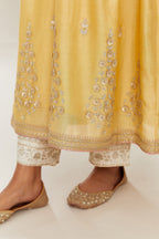Yellow silk chanderi kurta set with heavy gold gota and zari embroidery and emroidered cotton slip inside.