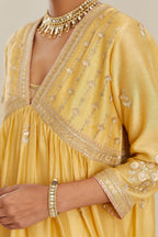 Yellow silk chanderi kurta set with heavy gold gota and zari embroidery and emroidered cotton slip inside.