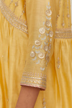 Yellow silk chanderi kurta set with heavy gold gota and zari embroidery and emroidered cotton slip inside.