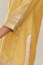 Yellow silk chanderi short kurta set with all over heavy gold gota and zari embroidery