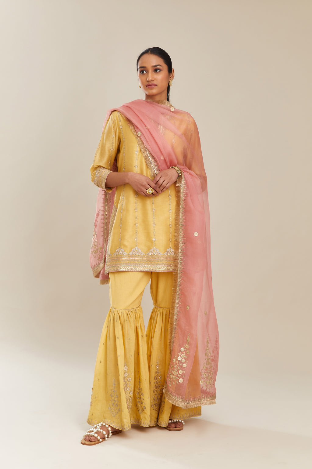 Yellow silk chanderi short kurta set with all over heavy gold gota and zari embroidery
