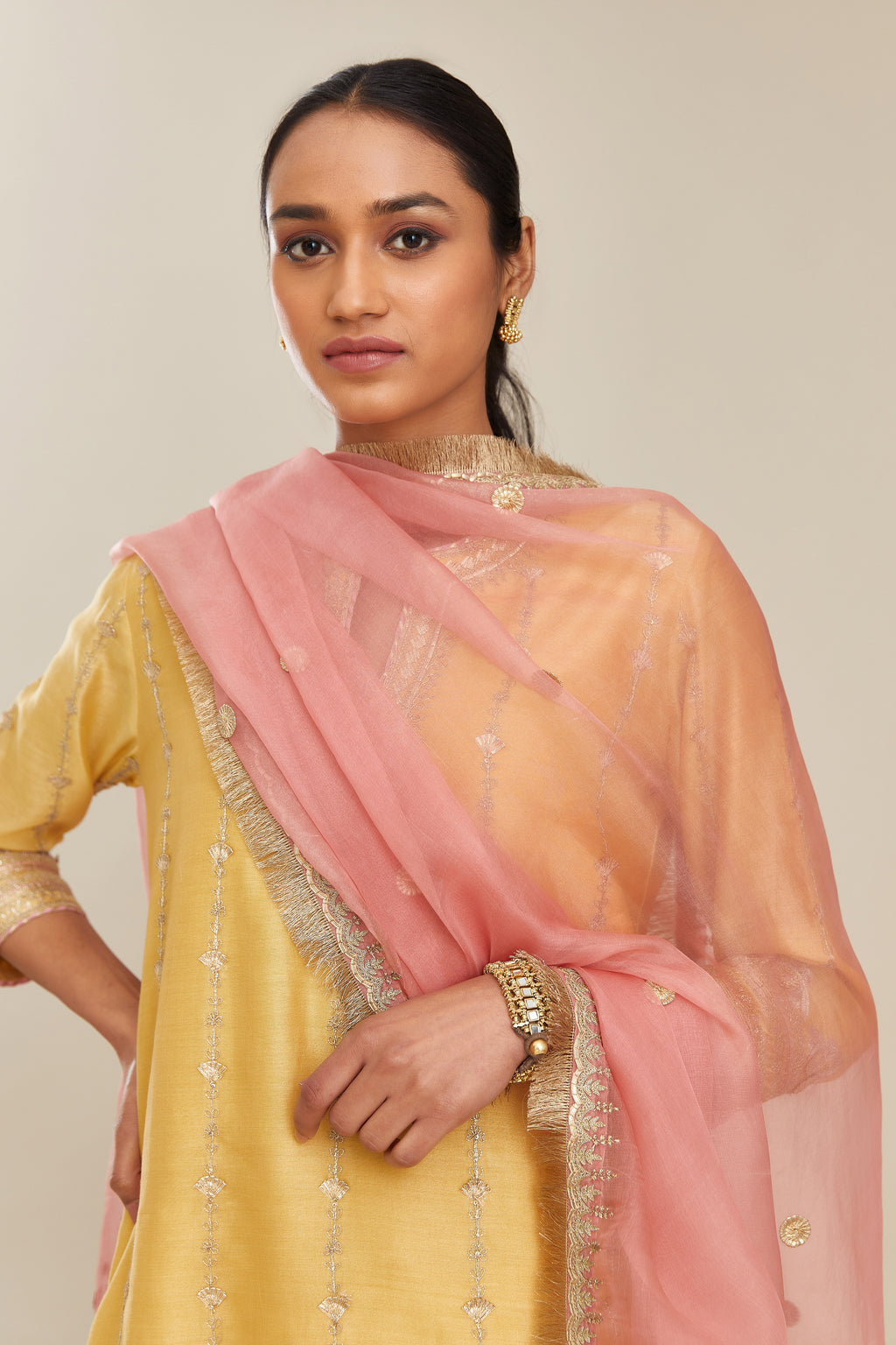 Yellow silk chanderi short kurta set with all over heavy gold gota and zari embroidery