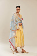 Yellow silk chanderi kurta set with heavy gold gota and zari embroidery and emroidered cotton slip inside.