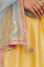 Yellow silk chanderi kurta set with heavy gold gota and zari embroidery and emroidered cotton slip inside.