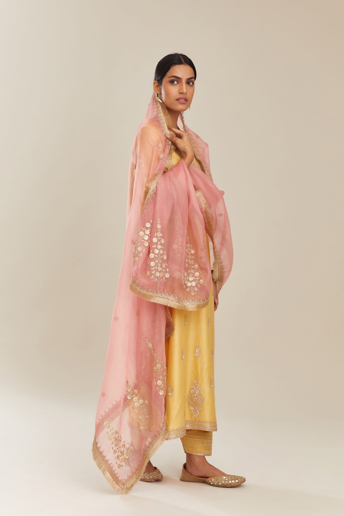 Pink silk organza dupatta with delicate gold zari and gota embroidery border running along all edges.