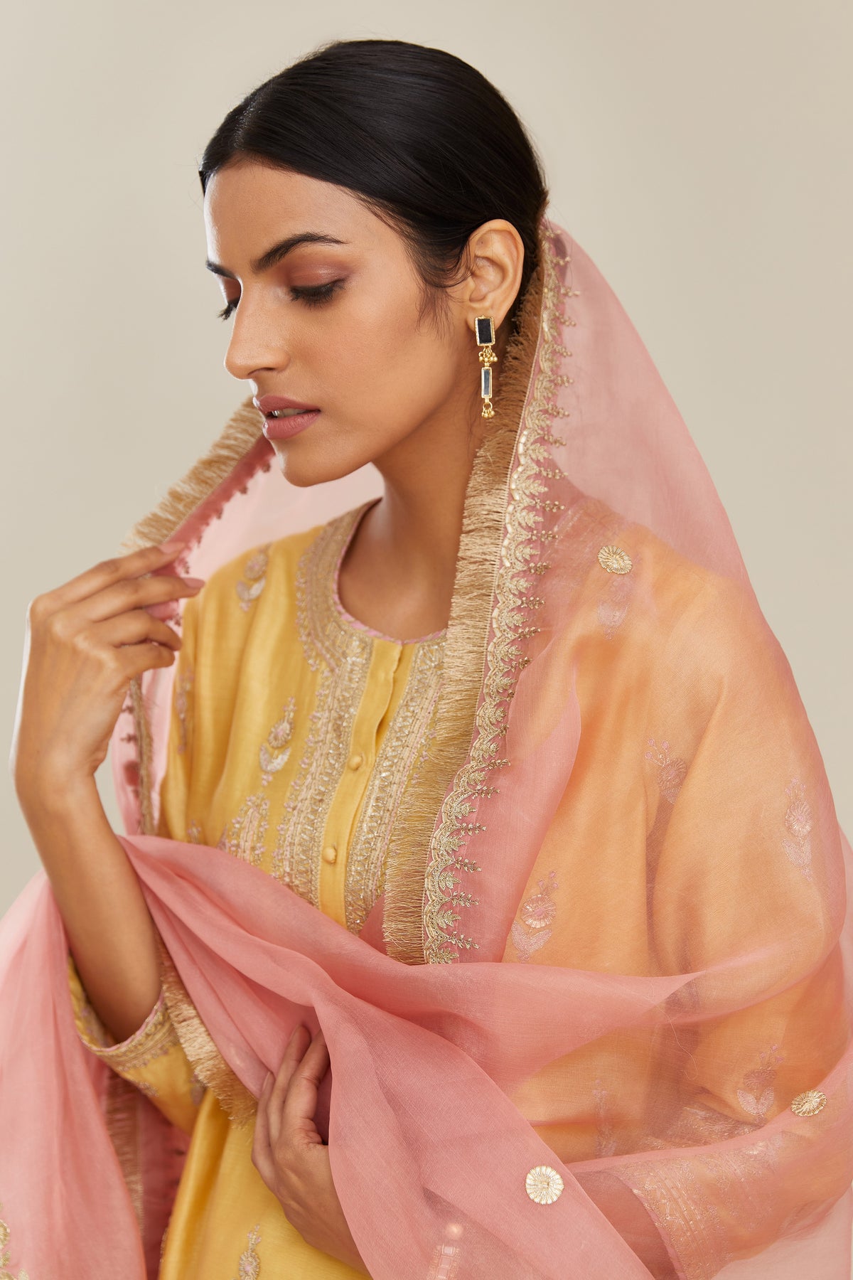 Yellow silk chanderi straight kurta set with gold gota and zari embroidery.