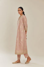 Old rose hand block printed silk chanderi kurta set with gold gota and zari embroidery butas and heavy borders at hem.