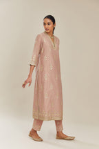 Old rose hand block printed silk chanderi kurta set with gold gota and zari embroidery butas and heavy borders at hem.