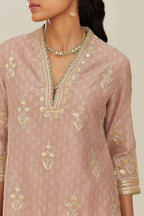 Old rose hand block printed silk chanderi kurta set with gold gota and zari embroidery butas and heavy borders at hem.