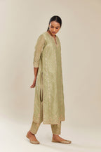 Sage green hand block printed silk chanderi straight kurta set with all over gold gota and zari embroidery.