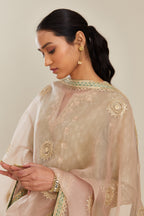 Sage green hand block printed silk chanderi straight kurta set with all over gold gota and zari embroidery.