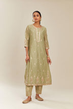 Sage green hand block printed silk chanderi kurta set with side panels, highlighted with gold gota and zari embroidery.