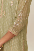 Sage green hand block printed silk chanderi kurta set with side panels, highlighted with gold gota and zari embroidery.