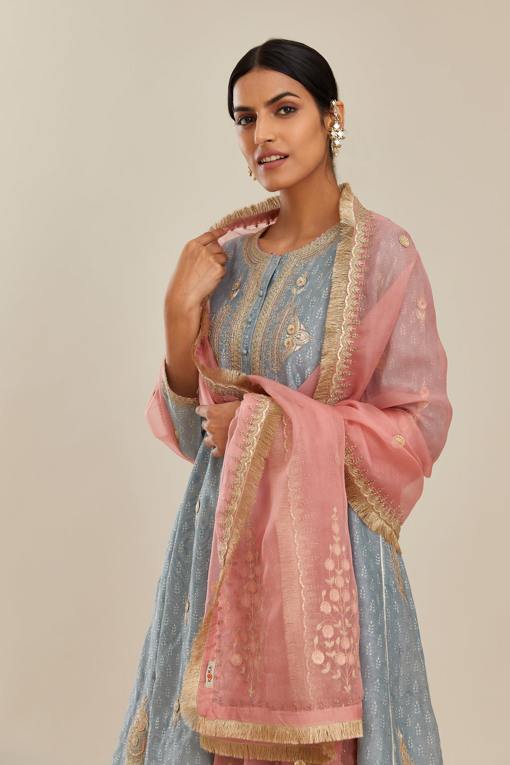 Powder blue hand block printed short kalidar silk chanderi kurta set with button placket and all over gold gota and zari embroidery.