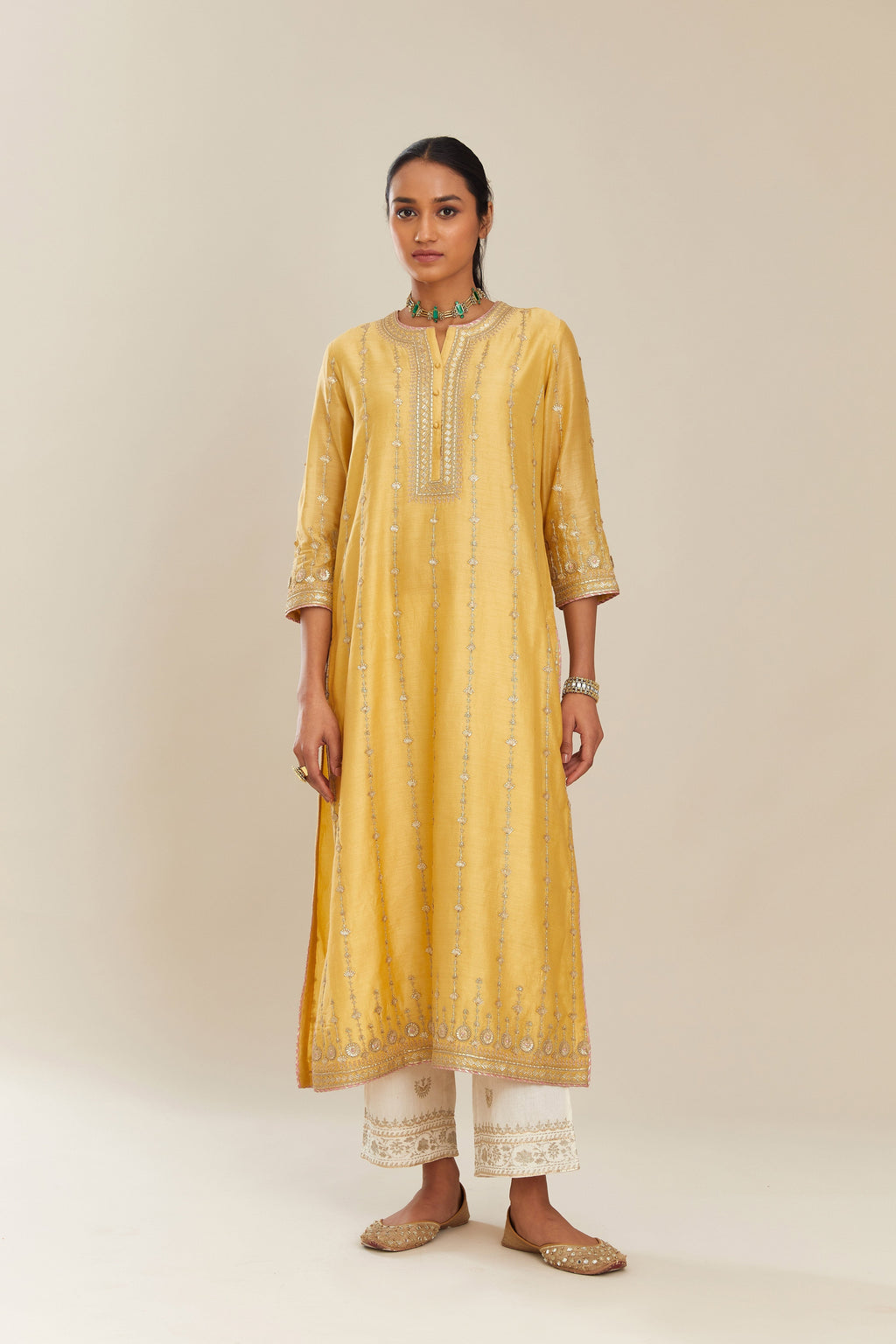 Yellow silk chanderi straight kurta set with all over heavy gold gota and zari embroidery
