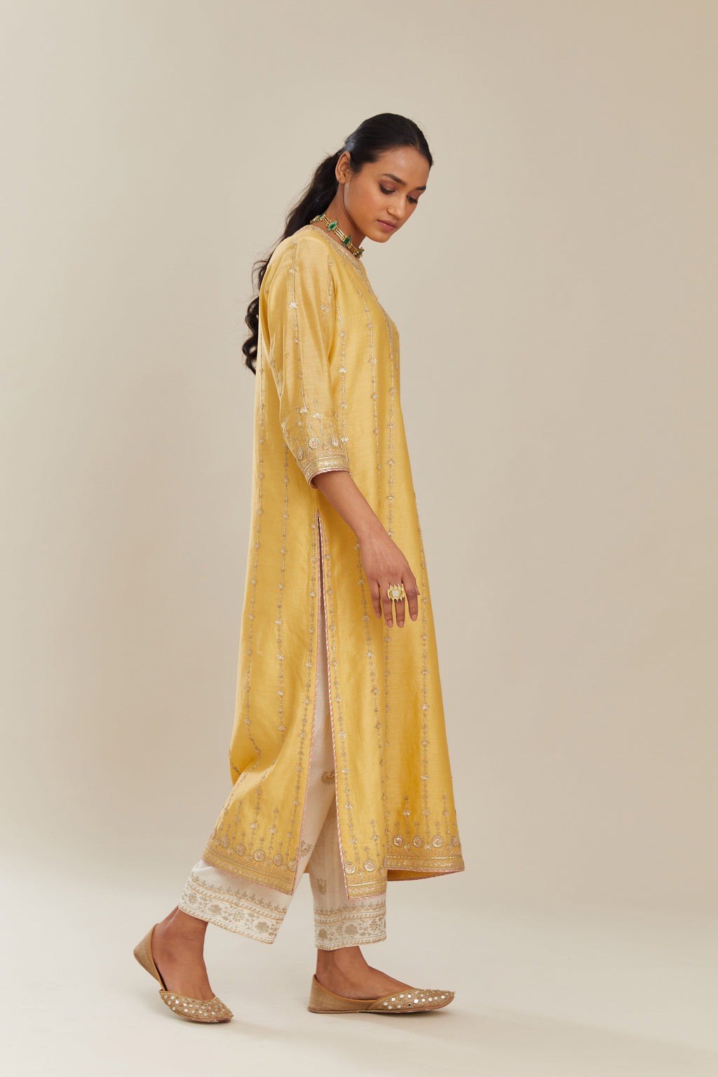 Yellow silk chanderi straight kurta set with all over heavy gold gota and zari embroidery