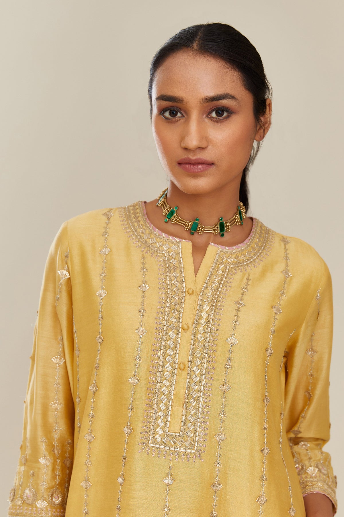 Yellow silk chanderi straight kurta set with all over heavy gold gota and zari embroidery