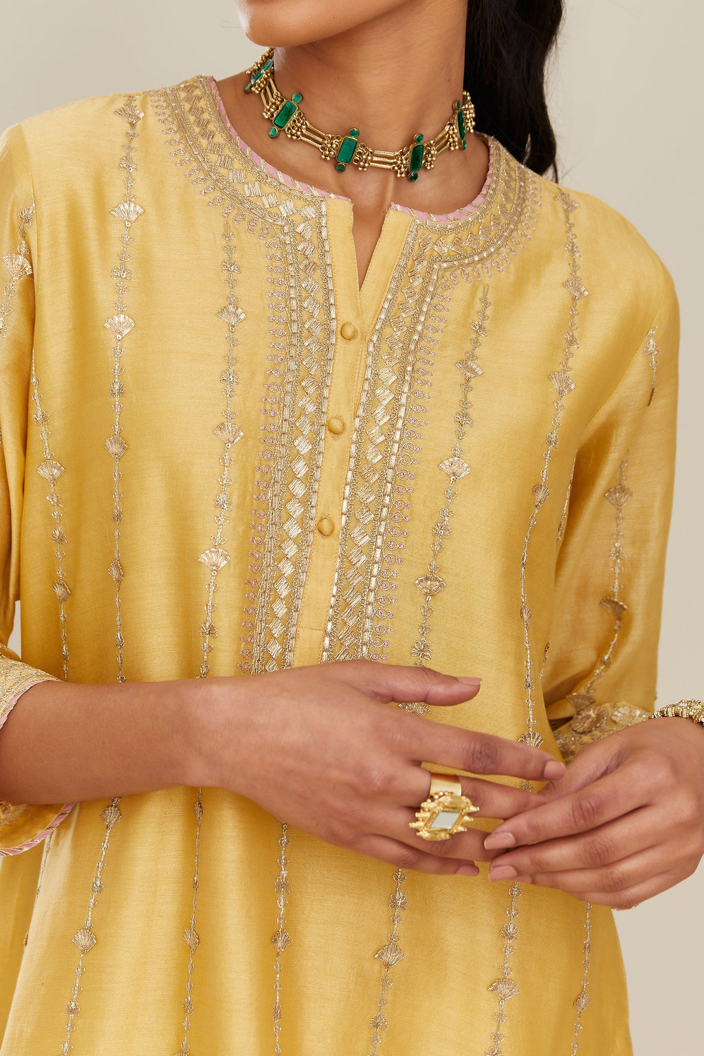 Yellow silk chanderi straight kurta set with all over heavy gold gota and zari embroidery