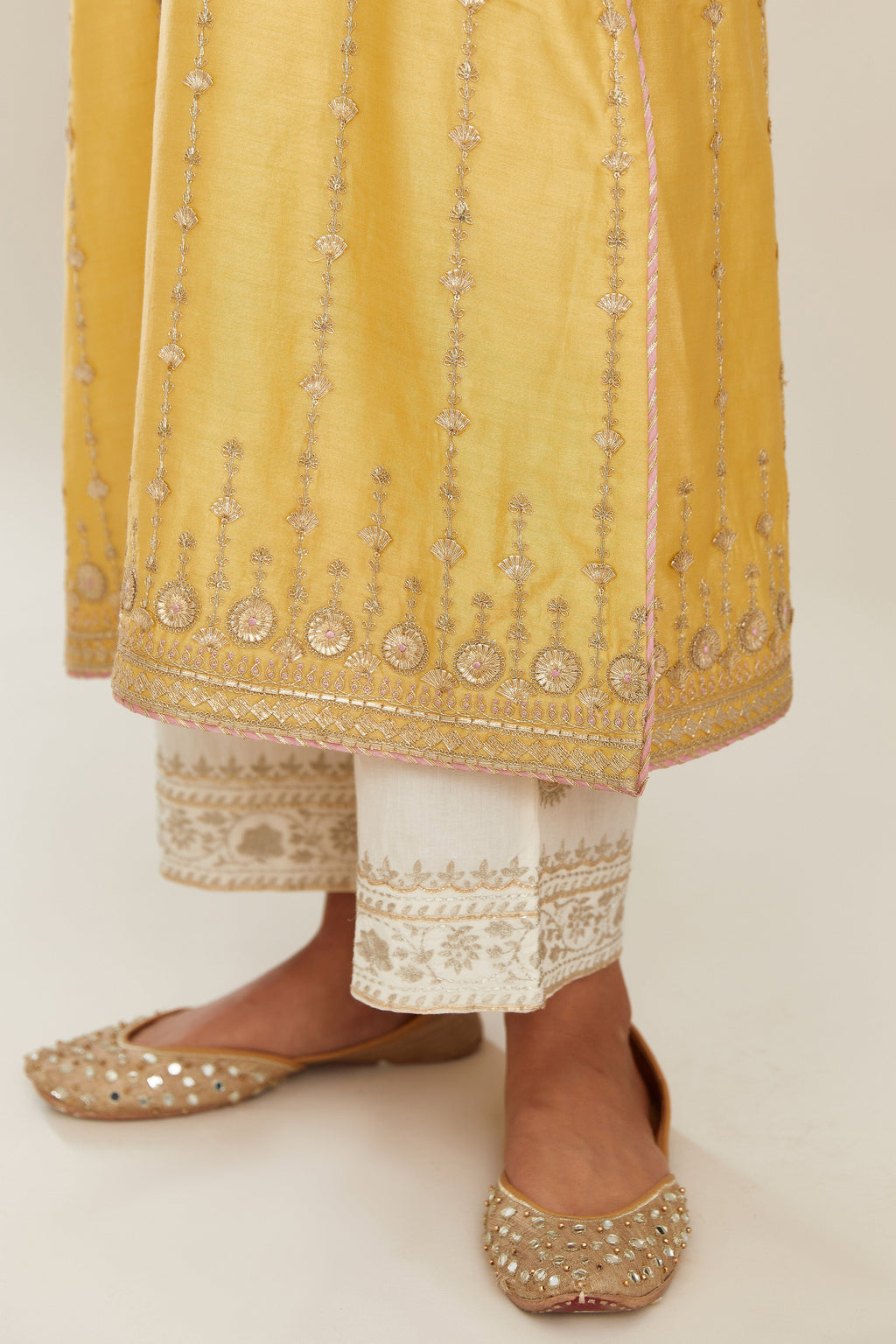 Yellow silk chanderi straight kurta set with all over heavy gold gota and zari embroidery