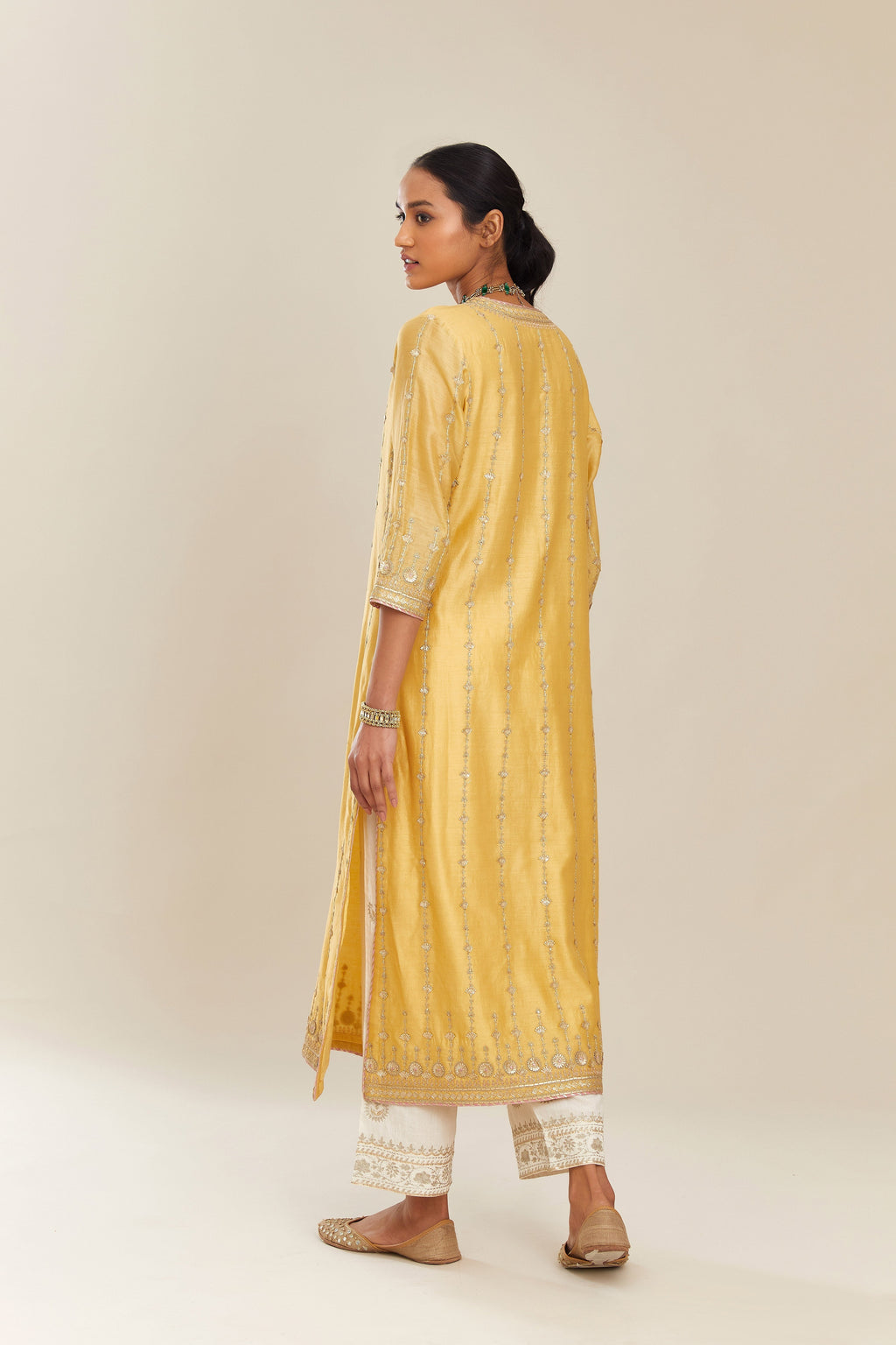Yellow silk chanderi straight kurta set with all over heavy gold gota and zari embroidery