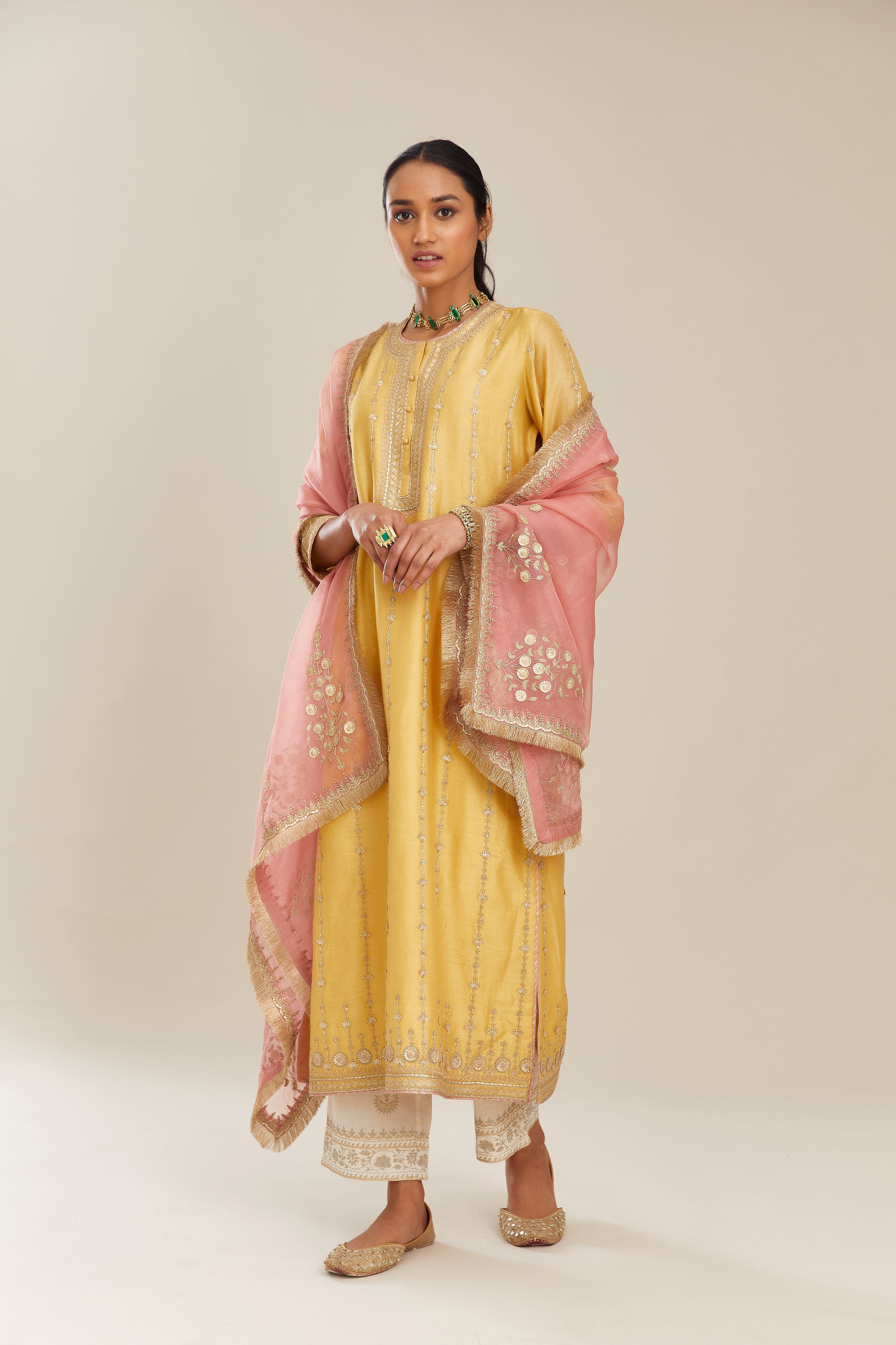 Yellow silk chanderi straight kurta set with all over heavy gold gota and zari embroidery