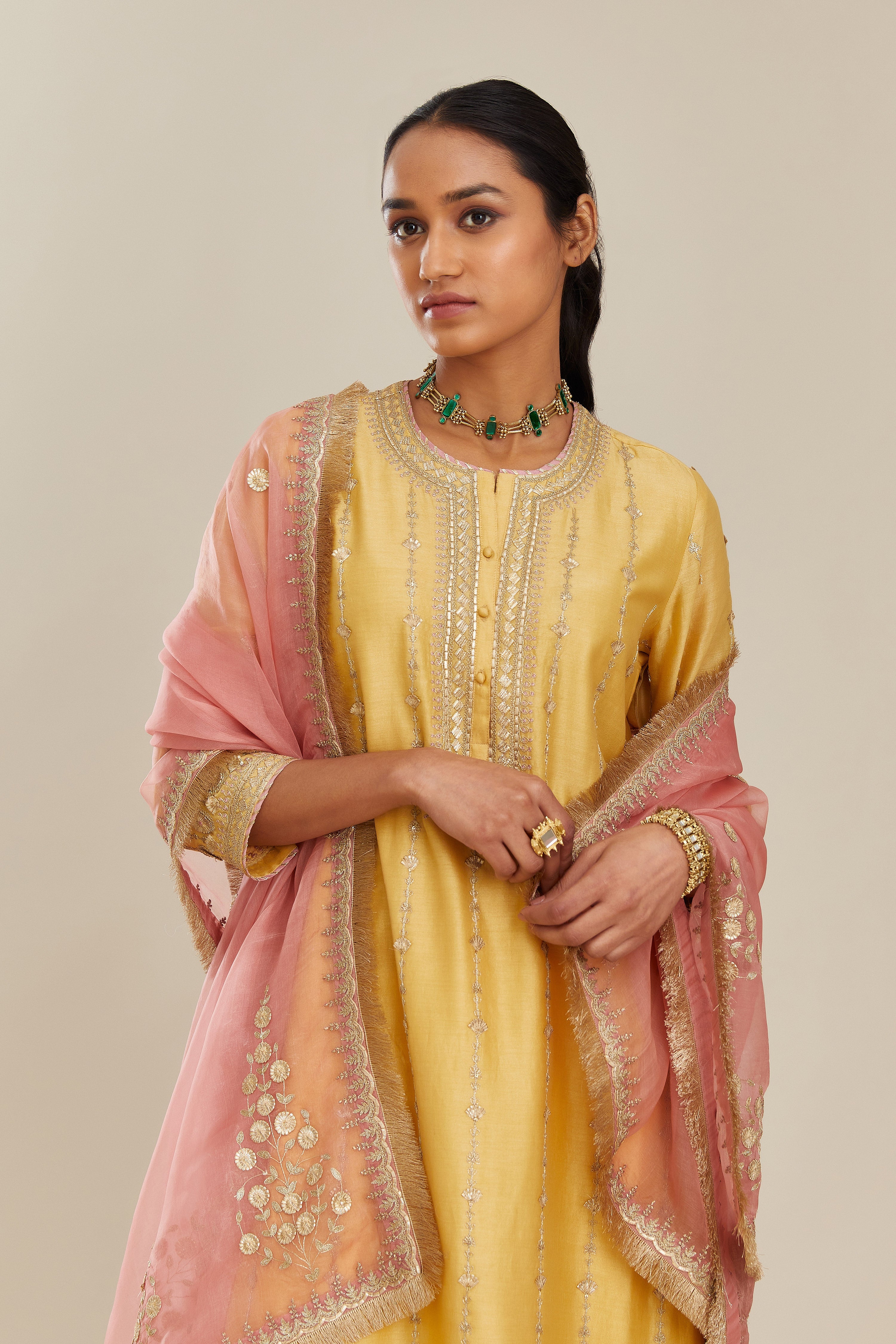 Yellow silk chanderi straight kurta set with all over heavy gold gota and zari embroidery