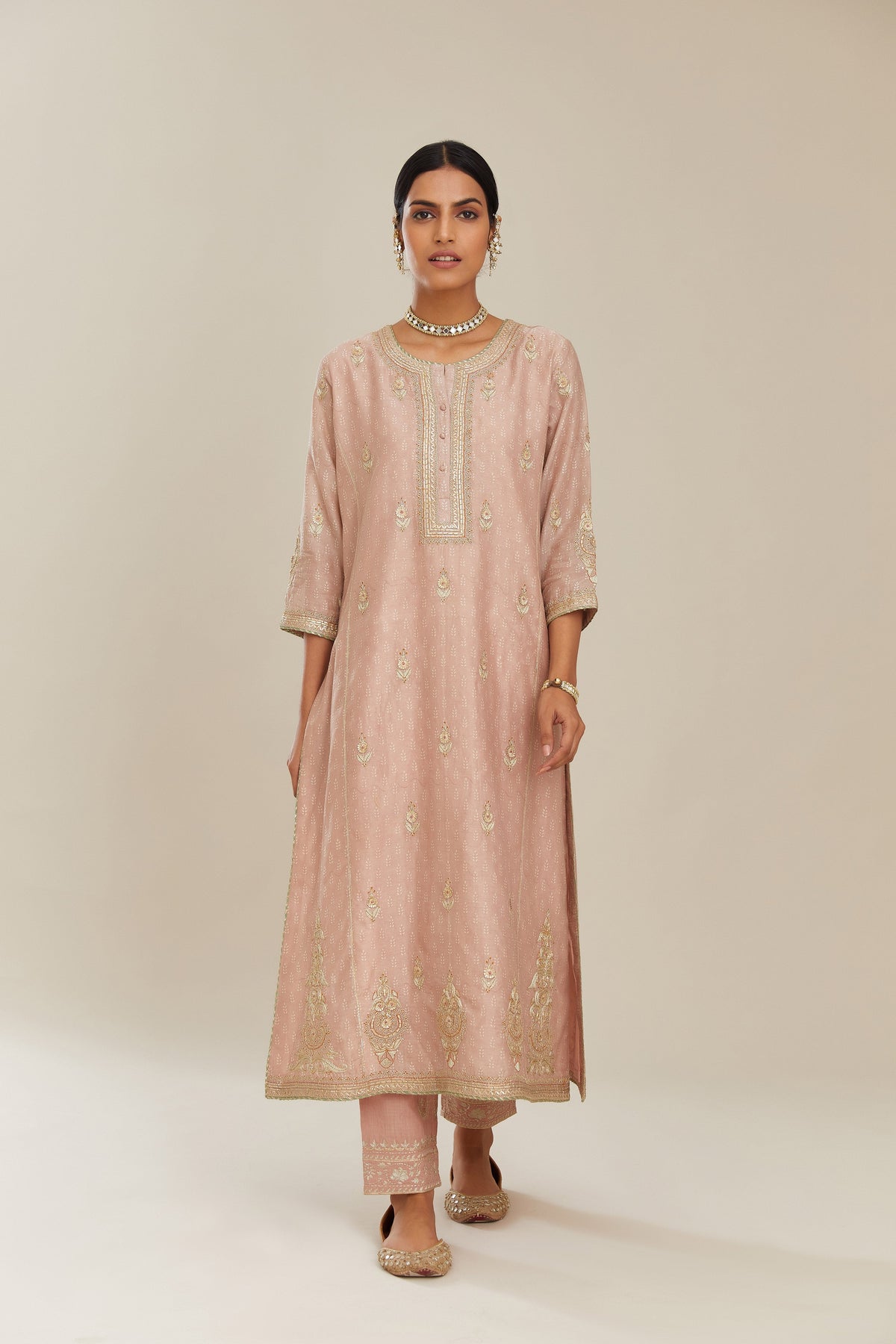 Old rose hand block printed silk chanderi kurta set with side panels, highlighted with gold gota and zari embroidery.