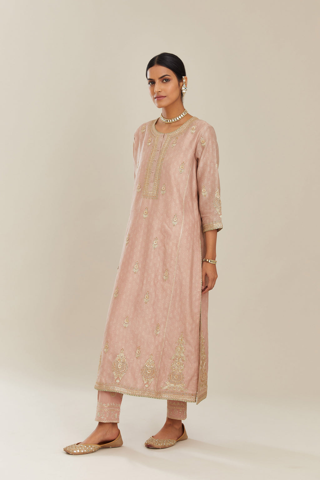 Old rose hand block printed silk chanderi kurta set with side panels, highlighted with gold gota and zari embroidery.