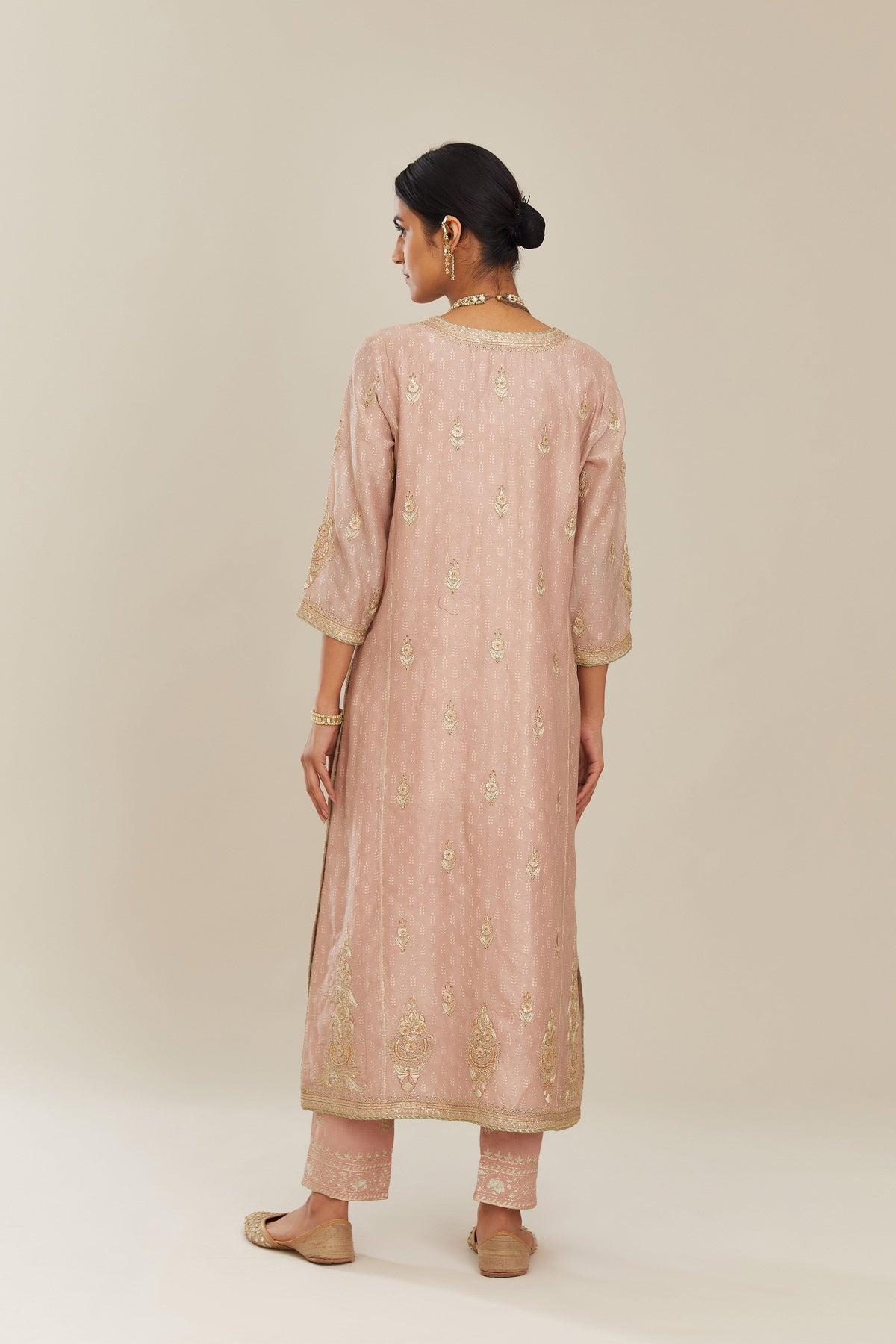 Old rose hand block printed silk chanderi kurta set with side panels, highlighted with gold gota and zari embroidery.