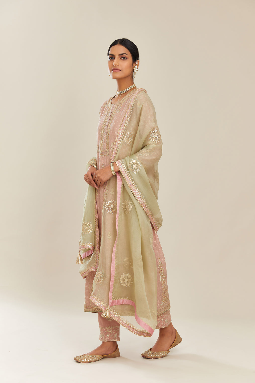 Sage green silk organza dupatta with delicate gold gota embroidery and contrast colored border running along all edges.