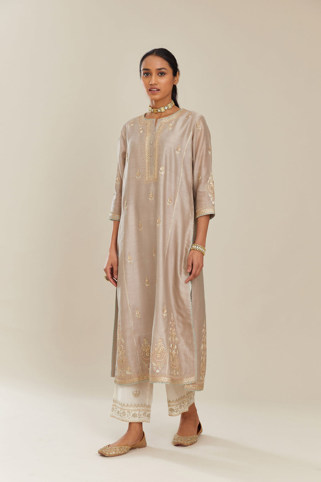 Grey silk chanderi kurta set with side panels, highlighted with gold gota and zari embroidery.