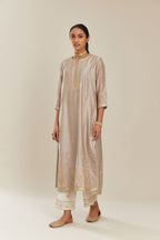 Grey silk chanderi kurta set with side panels, highlighted with gold gota and zari embroidery.