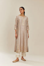 Grey silk chanderi kurta set with side panels, highlighted with gold gota and zari embroidery.