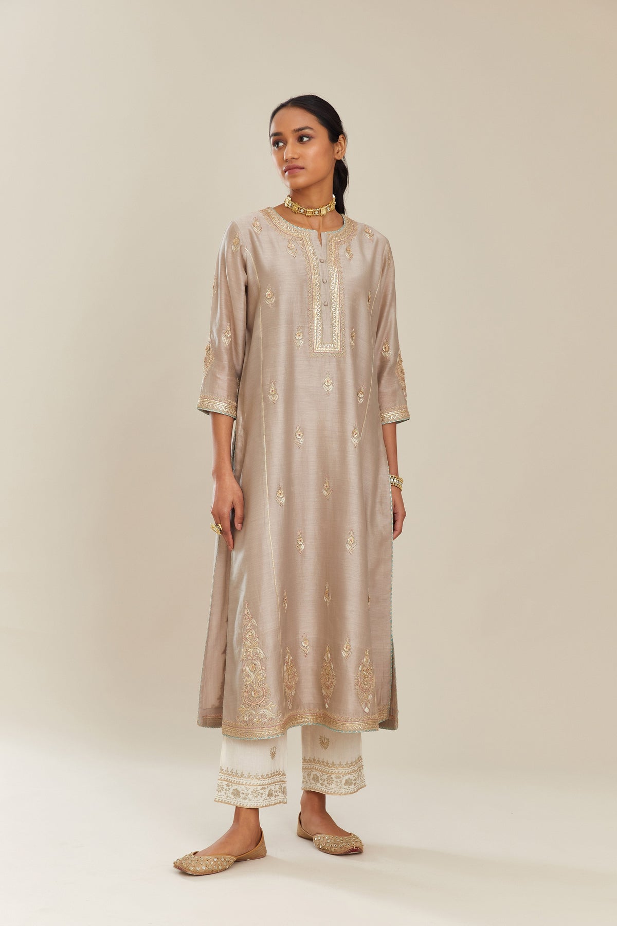 Grey silk chanderi kurta set with side panels, highlighted with gold gota and zari embroidery.