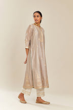 Grey silk chanderi kurta set with side panels, highlighted with gold gota and zari embroidery.