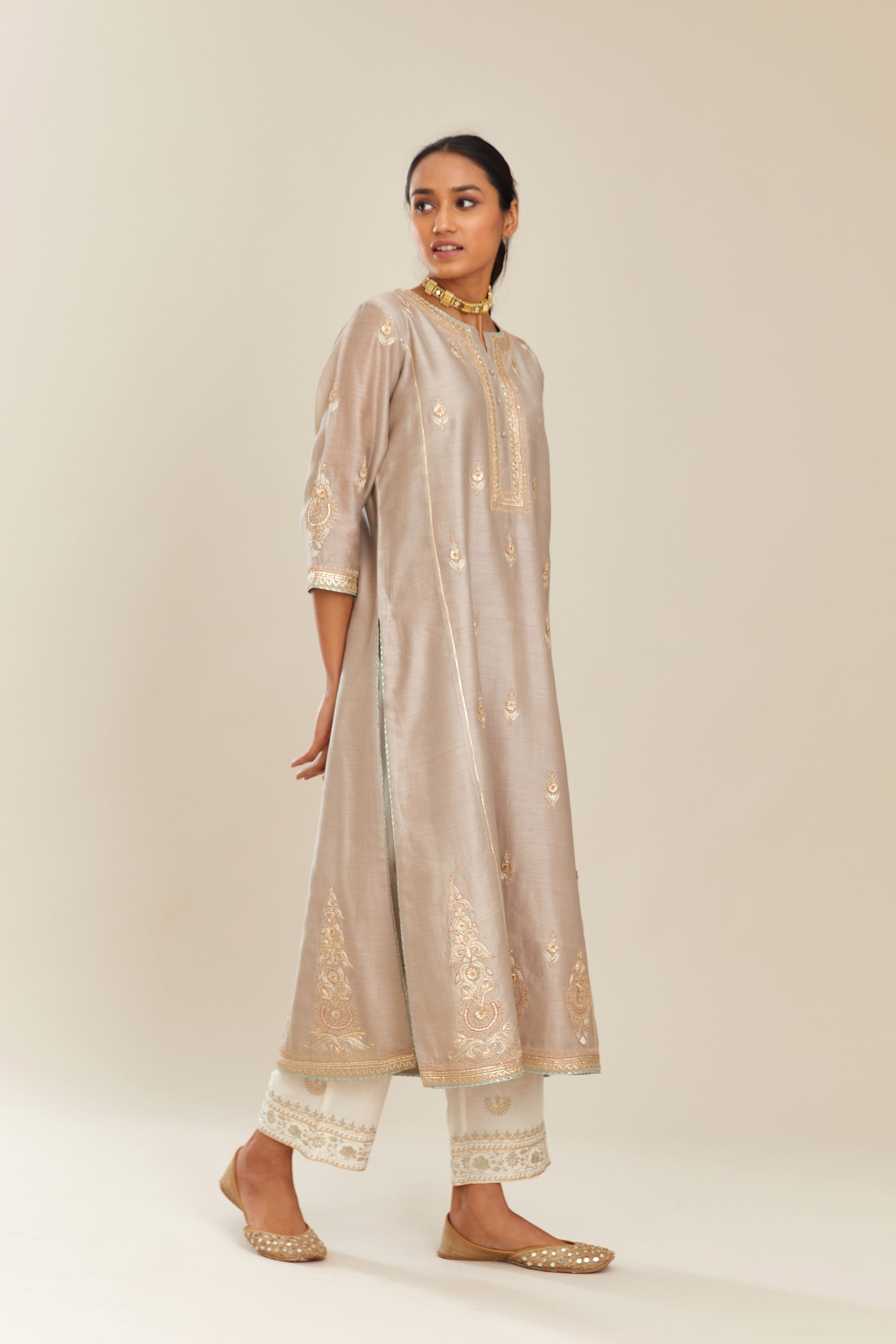 Grey silk chanderi kurta set with side panels, highlighted with gold gota and zari embroidery.