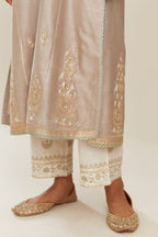 Grey silk chanderi kurta set with side panels, highlighted with gold gota and zari embroidery.