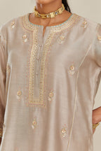 Grey silk chanderi kurta set with side panels, highlighted with gold gota and zari embroidery.