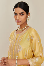 Yellow short kalidar silk chanderi kurta set with button placket and all over gold gota and zari embroidery.