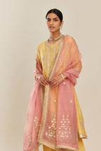 Yellow short kalidar silk chanderi kurta set with button placket and all over gold gota and zari embroidery.