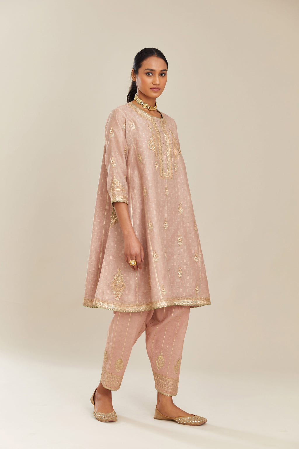 Old rose blue hand block printed short kalidar silk chanderi kurta set with button placket and all over gold gota and zari embroidery.