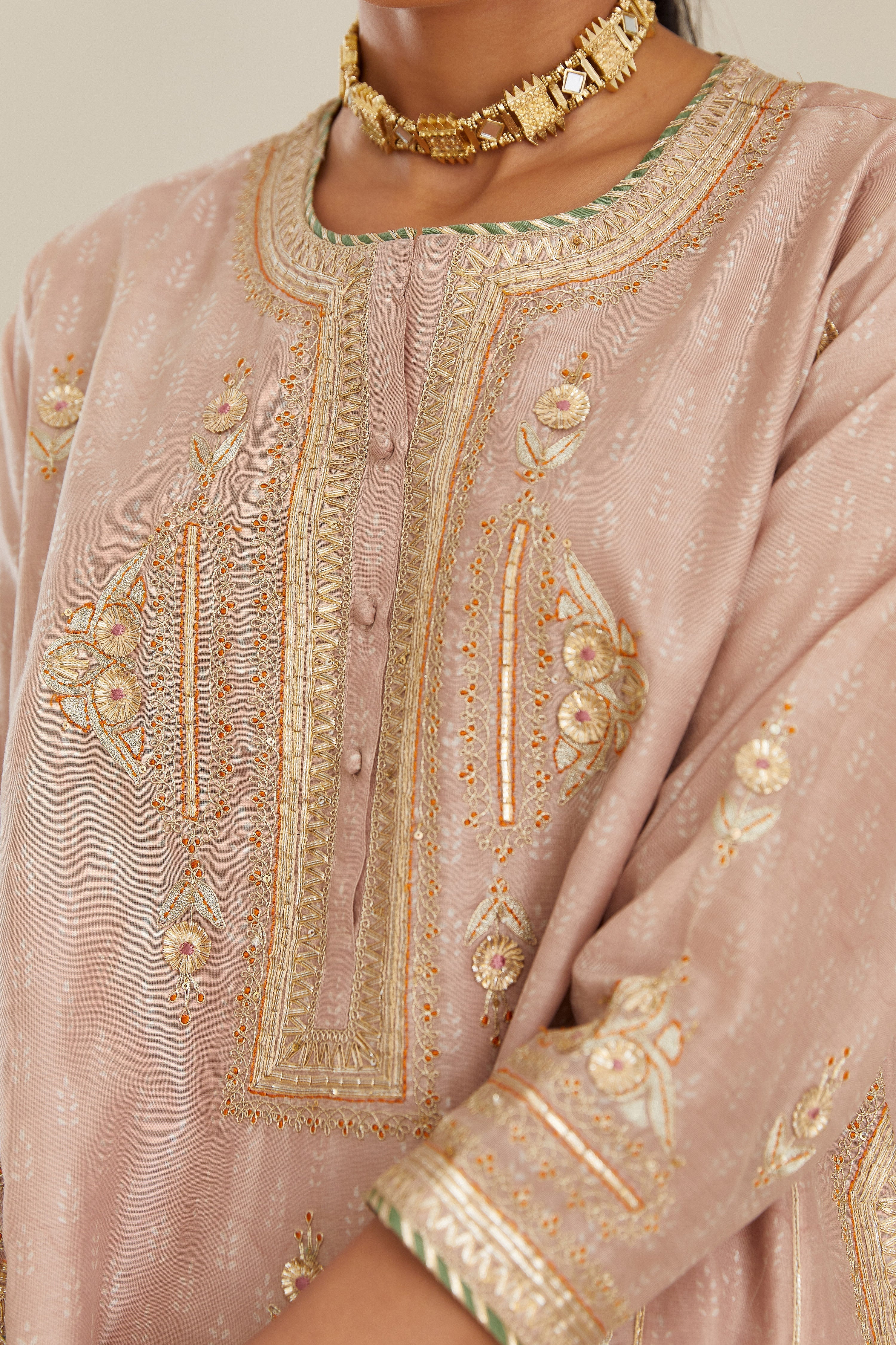 Old rose blue hand block printed short kalidar silk chanderi kurta set with button placket and all over gold gota and zari embroidery.