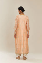 Peach silk chanderi straight kurta set with gold gota and zari embroidery.