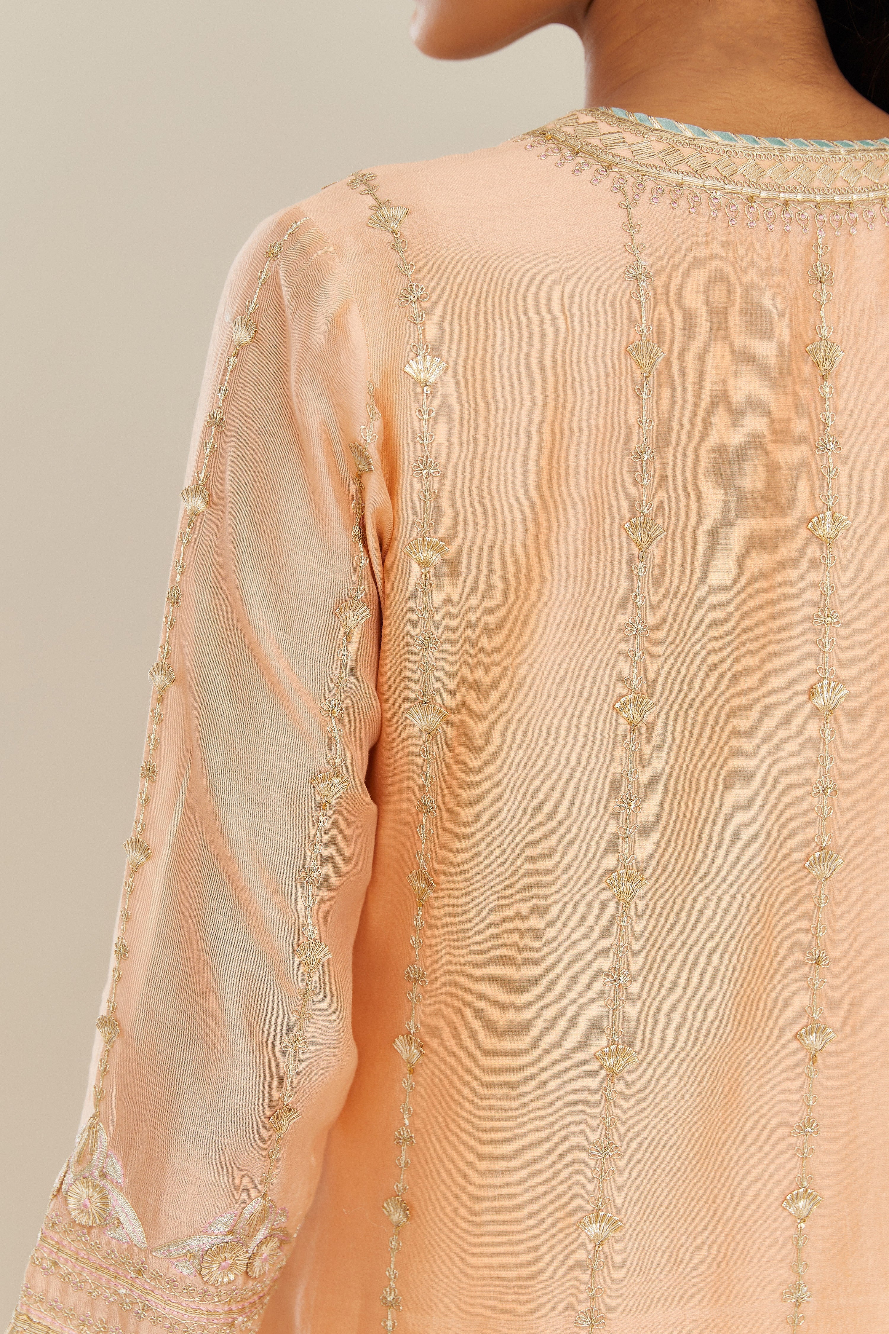 Peach silk chanderi short kurta set with all over heavy gold gota and zari embroidery