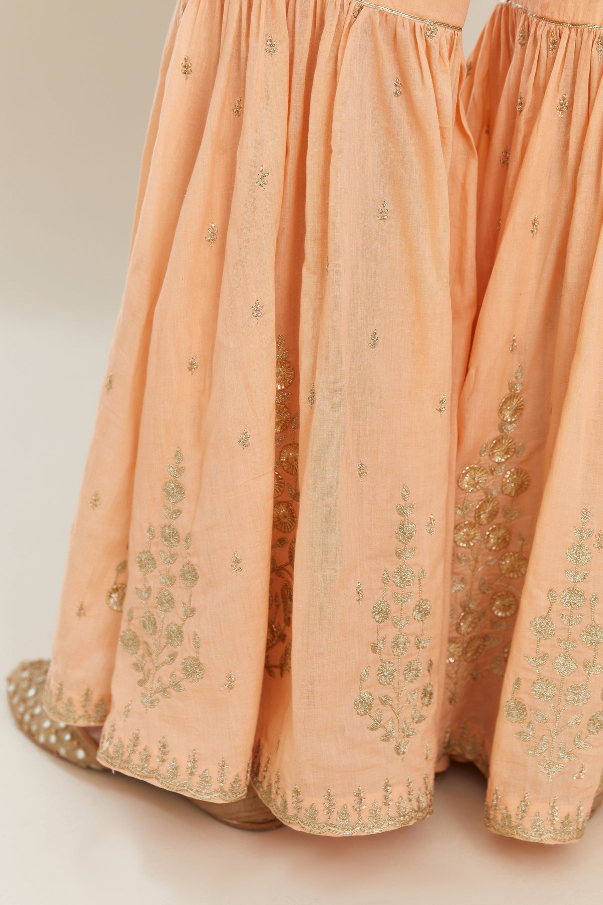 Peach silk chanderi short kurta set with all over heavy gold gota and zari embroidery