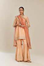 Peach silk chanderi short kurta set with all over heavy gold gota and zari embroidery