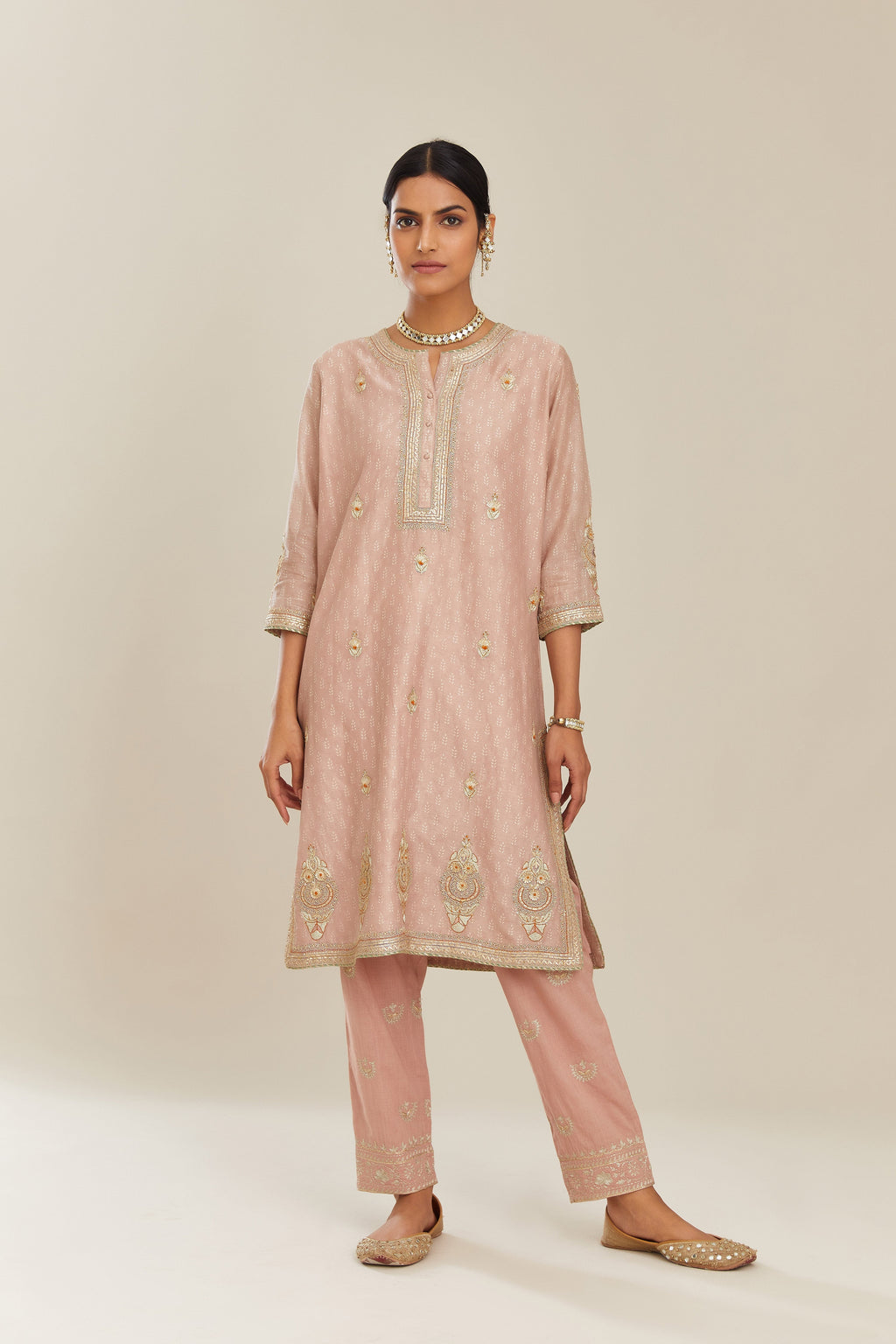 Old rose hand block printed silk chanderi short kurta set, highlighted with gold gota and zari embroidery.