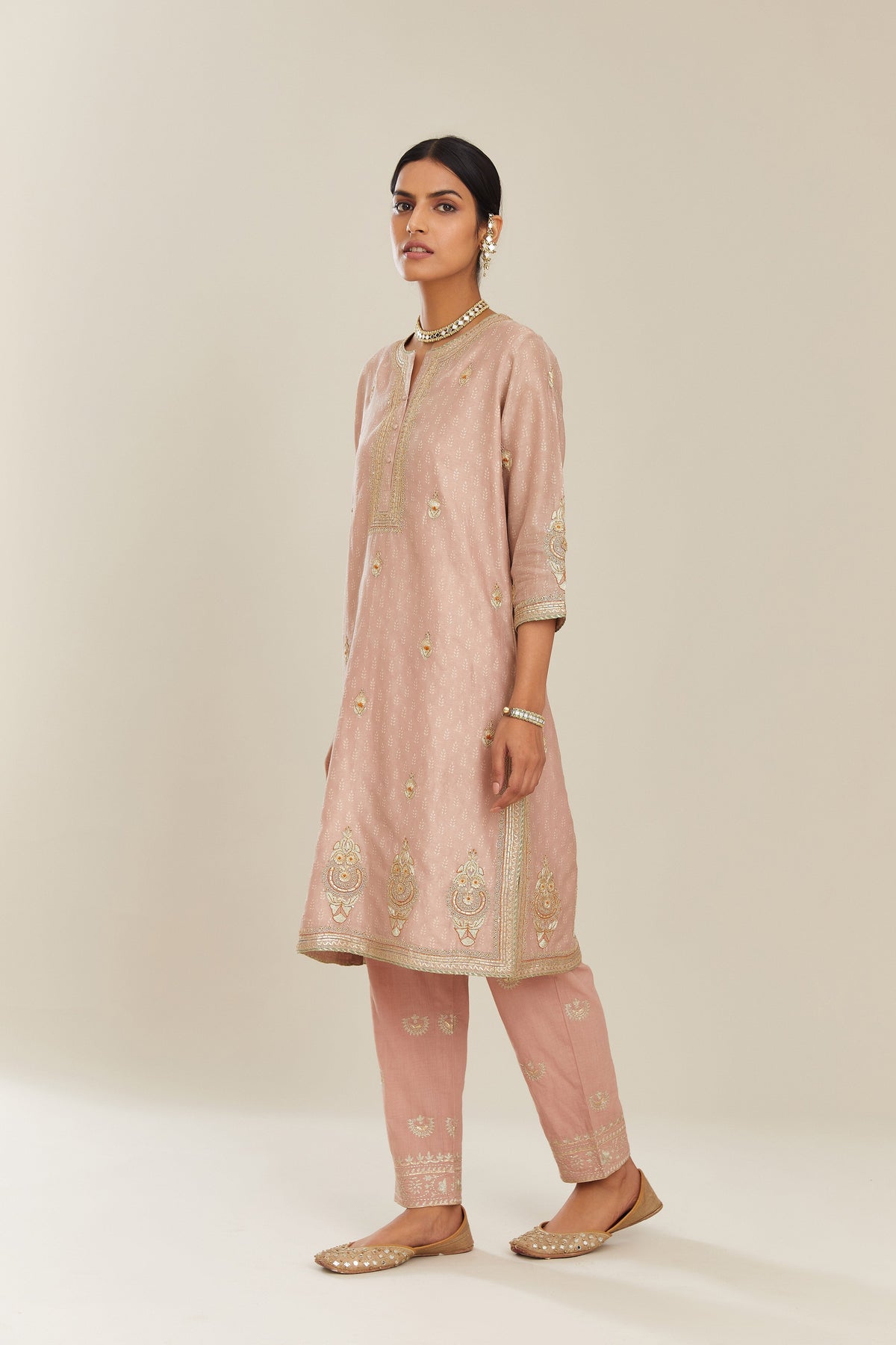 Old rose hand block printed silk chanderi short kurta set, highlighted with gold gota and zari embroidery.