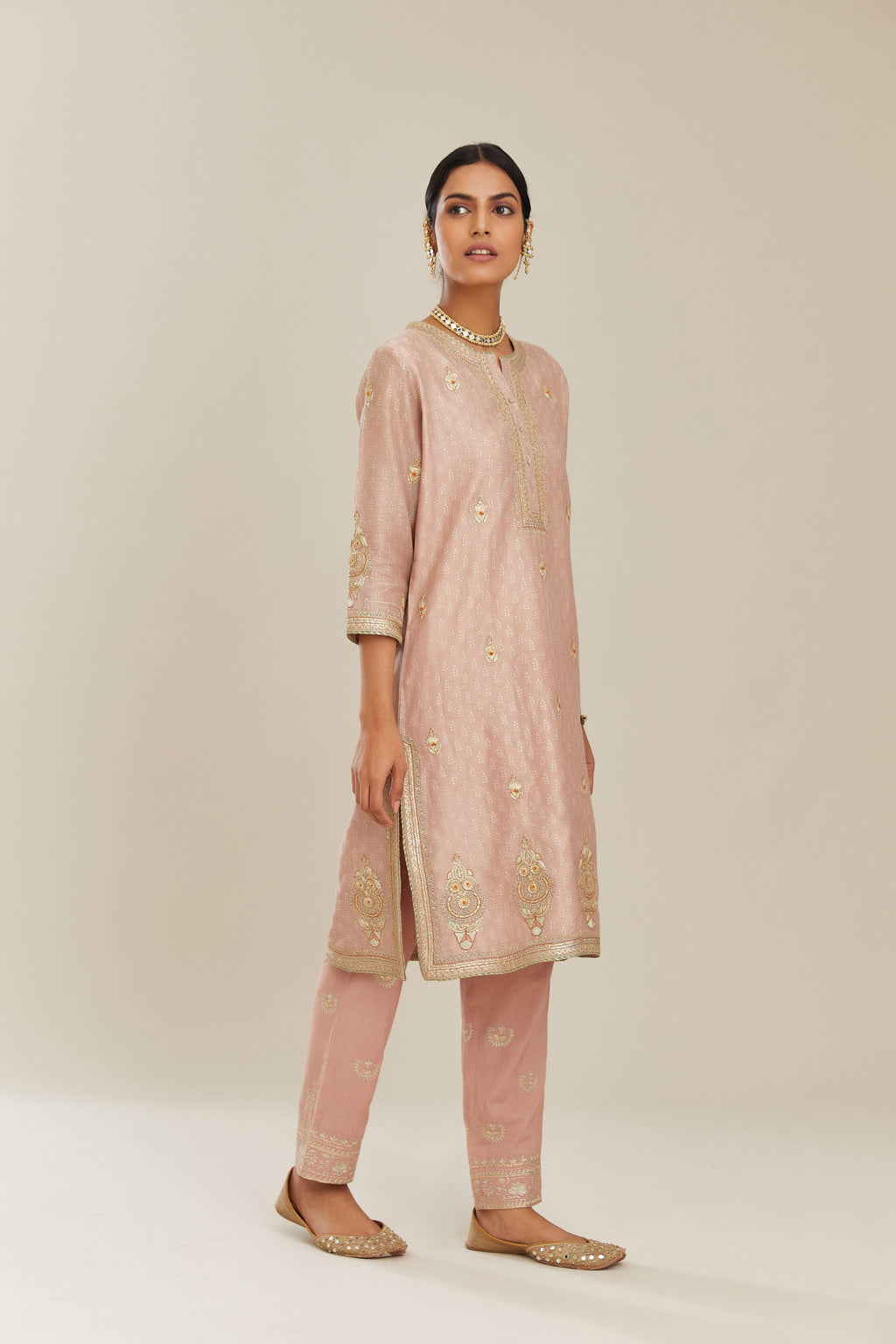 Old rose hand block printed silk chanderi short kurta set, highlighted with gold gota and zari embroidery.