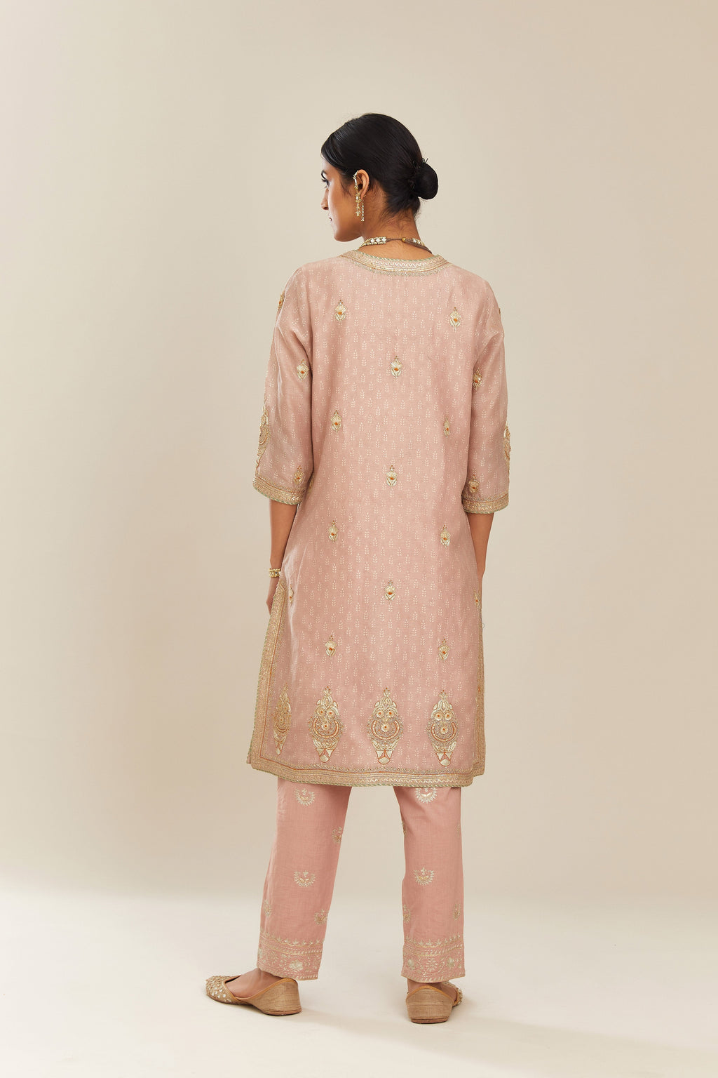 Old rose hand block printed silk chanderi short kurta set, highlighted with gold gota and zari embroidery.